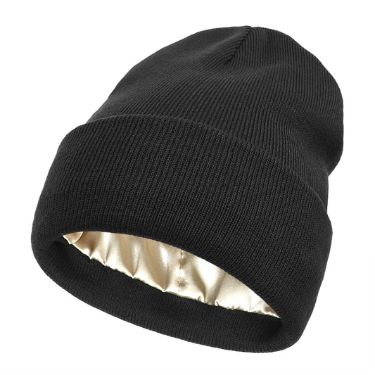 Black knit beanie with champagne satin lining and folded cuff