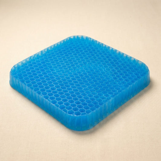 Blue gel honeycomb seat cushion on a warm cream studio background
