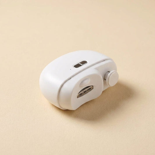 DailyEase 3-in-1 electric nail trimmer on a warm cream studio background